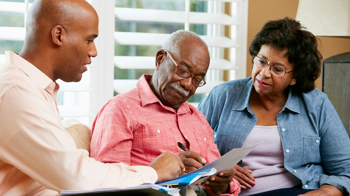 Patient signing Insurance Papers image